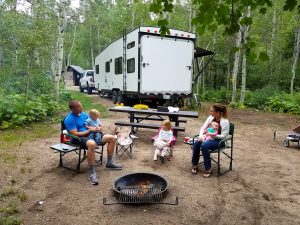 rv camping family campfire